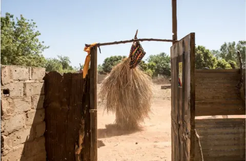 AFP Man wearing the traditional Kumpo man