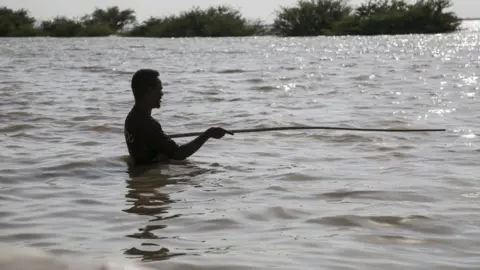 Getty Images Flood-affected Sudanese people face challenging circumstances in Al Lamab of Khartoum, Sudan on September 8, 2020.