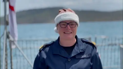 Smiling crew member of HMS Tamar