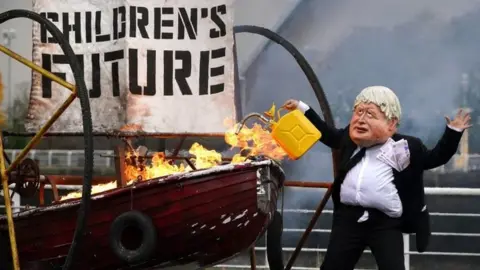 PA Media Protests outside COP26 venue