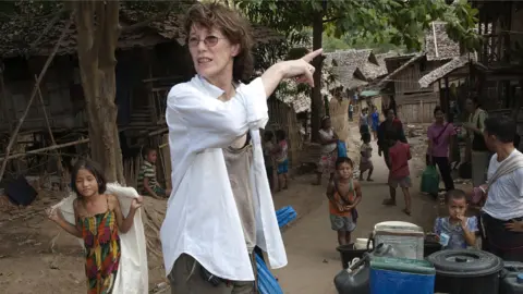 Getty Images Jane Birkin during a visit to a refugee camp in Myanmar in 2010. She was a longtime pro-democracy activist