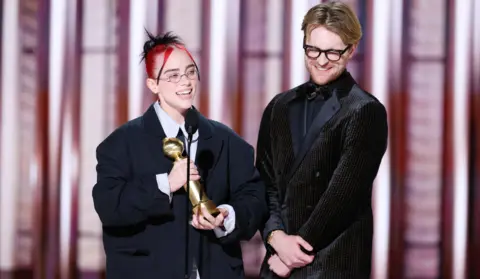 Getty Images Billie Eilish and FINNEAS accepts the award for Best Original Song Motion Picture for "What Was I Made For?" Barbie Music & Lyrics at the 81st Golden Globe Awards held at the Beverly Hilton Hotel on January 7, 2024 in Beverly Hills, California