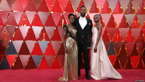 Getty Images Lupita Nyong'o, Danai Gurira and Winston Duke