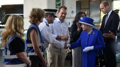 Reuters The Queen meets police and volunteers