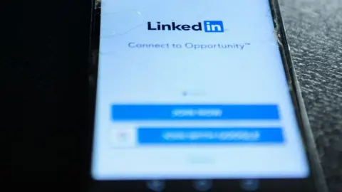 Getty Images LinkedIn logo on mobile phone