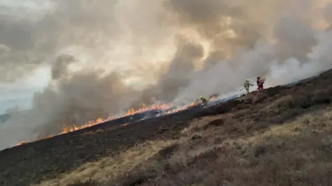 West Yorkshire Fire and Rescue Service Firefighters on the moorland