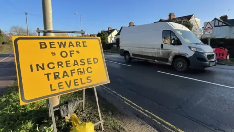 BBC A road works sign on one of the main roads into and out of Cambridge