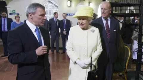 Pacemaker Queen Elizabeth II and the Duke of Edinburgh during a visit to Crumlin Road Gaol, Belfast, on day two of their visit to Northern Ireland in 2014