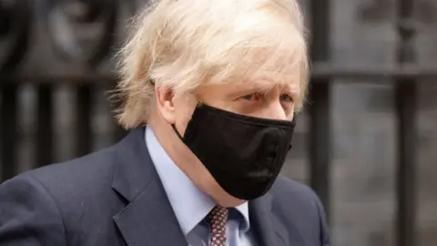 Reuters Boris Johnson wearing a face mask