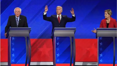 Getty Images Democratic presidential hopefuls Bernie Sanders (left), Former US Vice President Joe Biden (centre) and Elizabeth Warren