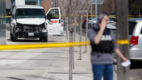 Getty Images Police inspect a van suspected of being involved in a collision injuring at least eight people at Yonge St. and Finch Ave. on April 23, 2018 in Toronto, Canada.