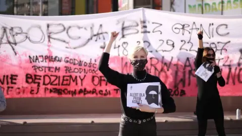 Reuters Women protest against imposing further restrictions on abortion law in Poland in Szczecin, Poland October 22, 2020