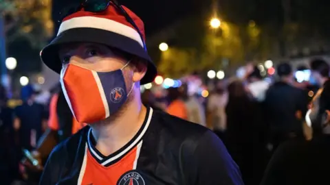 Getty Images A PSG fan in Paris