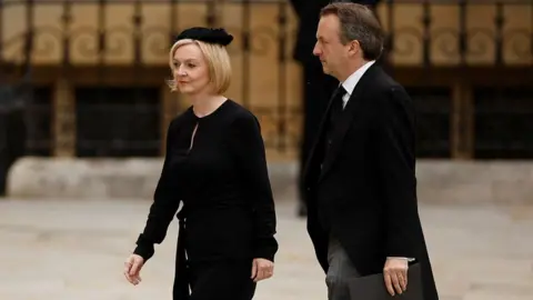 Liz Truss and her husband