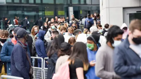 Getty Images People queuing outside Tottenham Hotspur