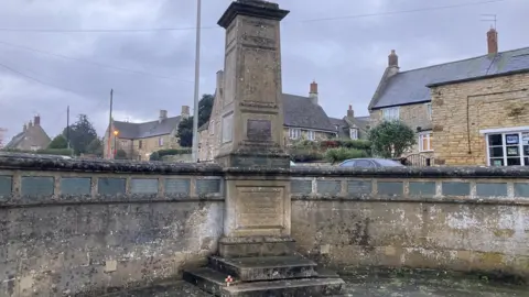 Knitted poppies at Gretton war memorial