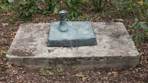 ArtUK A statue with just Steve Ovett's foot remaining, after the rest of it was stolen in 2007