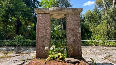 There are various stone structures at the garden