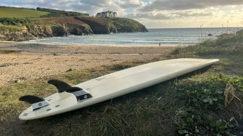 Chris Farrant Surfboard by the sea