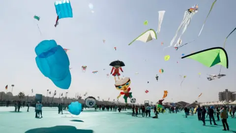 Getty Images A scene from this year's international kite festival in Gujarat
