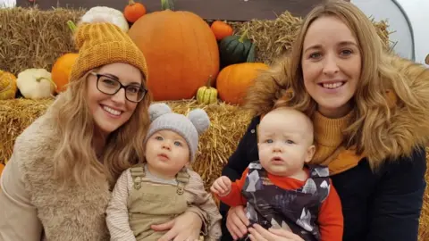 Steph and Kayleigh at a pumpkin catch with their two youngest babies