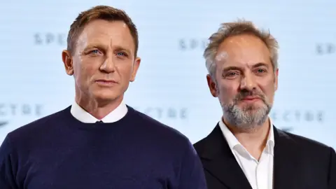 Getty Images Daniel Craig with Sam Mendes in 2014