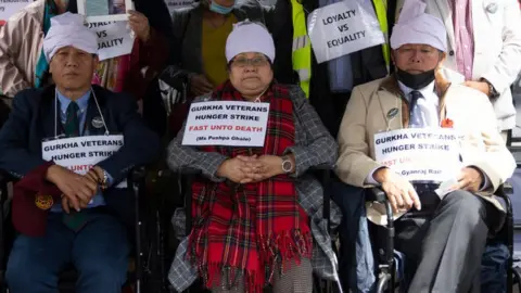 Getty Images Three Gurkha veterans on hunger strike outside Downing Street