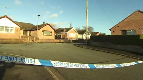 Police tape at the scene on Kilburn Drive, Shevington