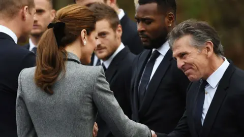 PAUL ELLIS/AFP/Getty Images Prince William and Catherine meet senior figures from Leicester City