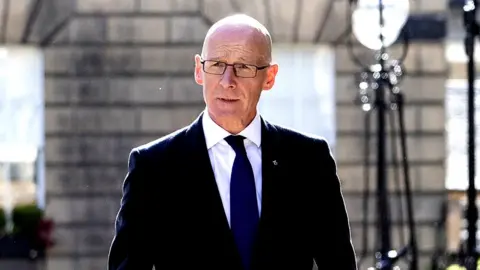 PA Media John Swinney