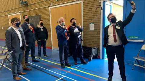 Labour's Hefin David and his team take a selfie after winning in Caerphilly