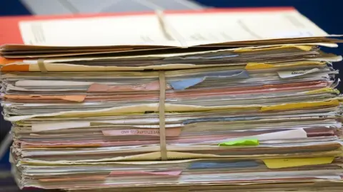 Science Photo Library Stack of files