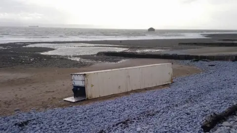 Steve Marsh shipping container on beach