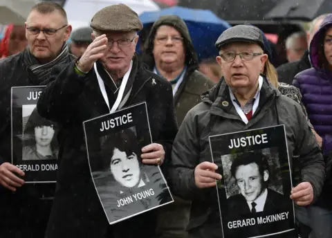 Getty Images Families gathered outside The Museum of Free Derry, close to where the killings took place