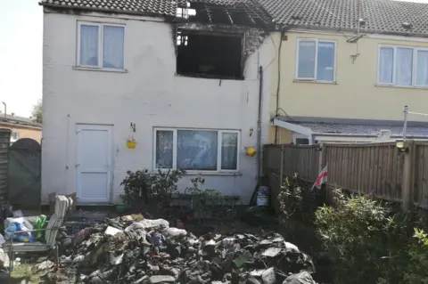 Mark Booth House gutted by fire