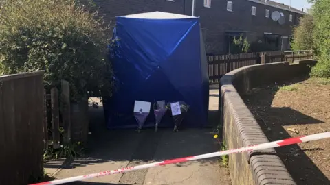 PA Media A police forensic tent in Lapworth Grove in the Balsall Heath area of Birmingham.