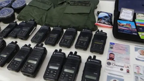 AFP An official Venezuelan image showing equipment seized during an alleged incursion attempt, 6 May 2020