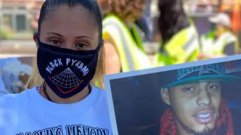 Angelique Negroni-Kearse Angelique Negroni-Kearse with picture of husband Andrew Kearse