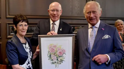 Getty Images Linda Hurley, David Hurley and Prince Charles