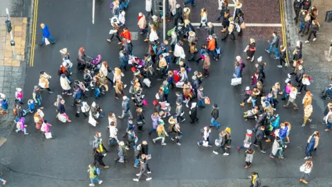 Getty Images Crowd in Edinburgh street