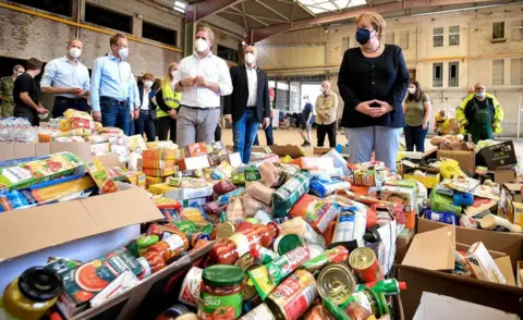Getty Images Bad Münstereifel food relief centre visited by Mrs Merkel, 20 Jul 21