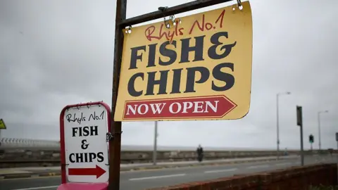 Getty Images Fish and chips sign in Rhyl, Denbighshire