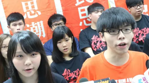 Getty Images Scholarism spokeswoman Agnes Chow Ting (Left) and Scholarism Convenor Joshua Wong Chi-fung , 2016