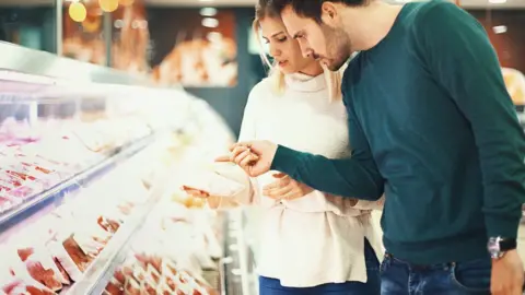 Getty Images Shopping at supermarket