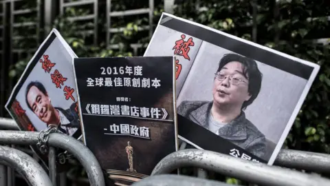 Getty Images Placards showing missing bookseller Lee Bo and his associate Gui Minhai