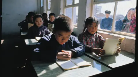Bettmann/Getty Images General view of children attending class in a Peking school during the time of President Nixon's visit to China.