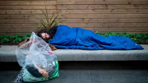 Getty Images Man sleeping rough in London