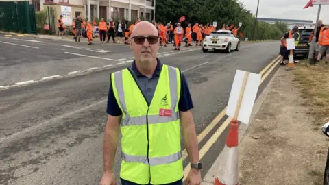 Justin Dealey/BBC Unite regional officer Richard Gates