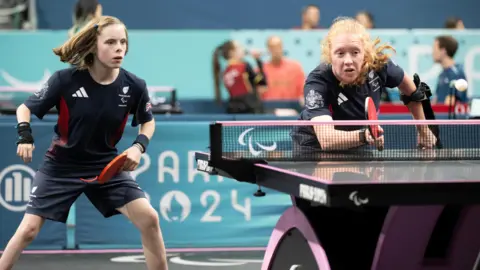 PA Media Bly Twomey and Fliss Pickard winning bronze at the Paralympics.