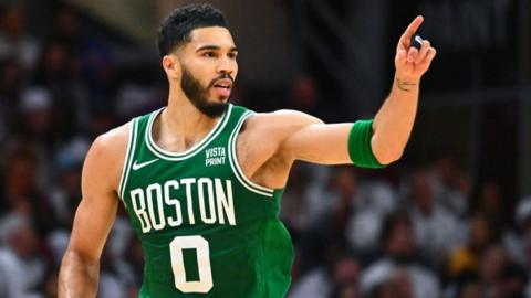 Boston Celtics forward Jayson Tatum gestures